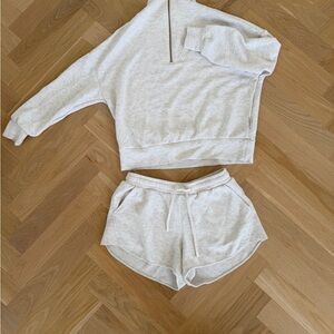 Varley DoubleSoft Light Heather Gray Zip 1/4 Pullover and matching shorts.